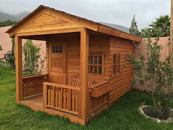 Redwood playouse with front porch uses knotty redwood boards.